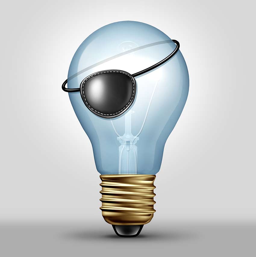 Illustration of a lightbulb with pirate eye patch symbolizing idea theft